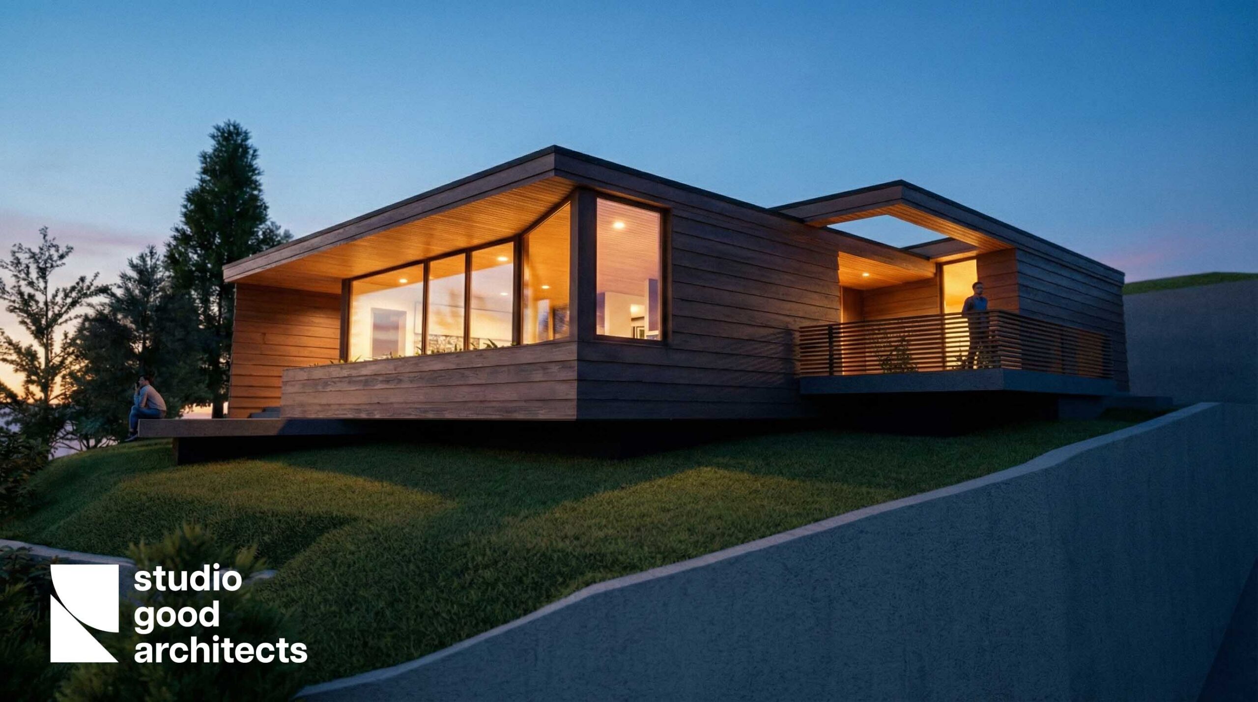 Modern wooden house design by Studio Good Architects, featuring large windows and a spacious deck, set on a grassy hillside during twilight.
